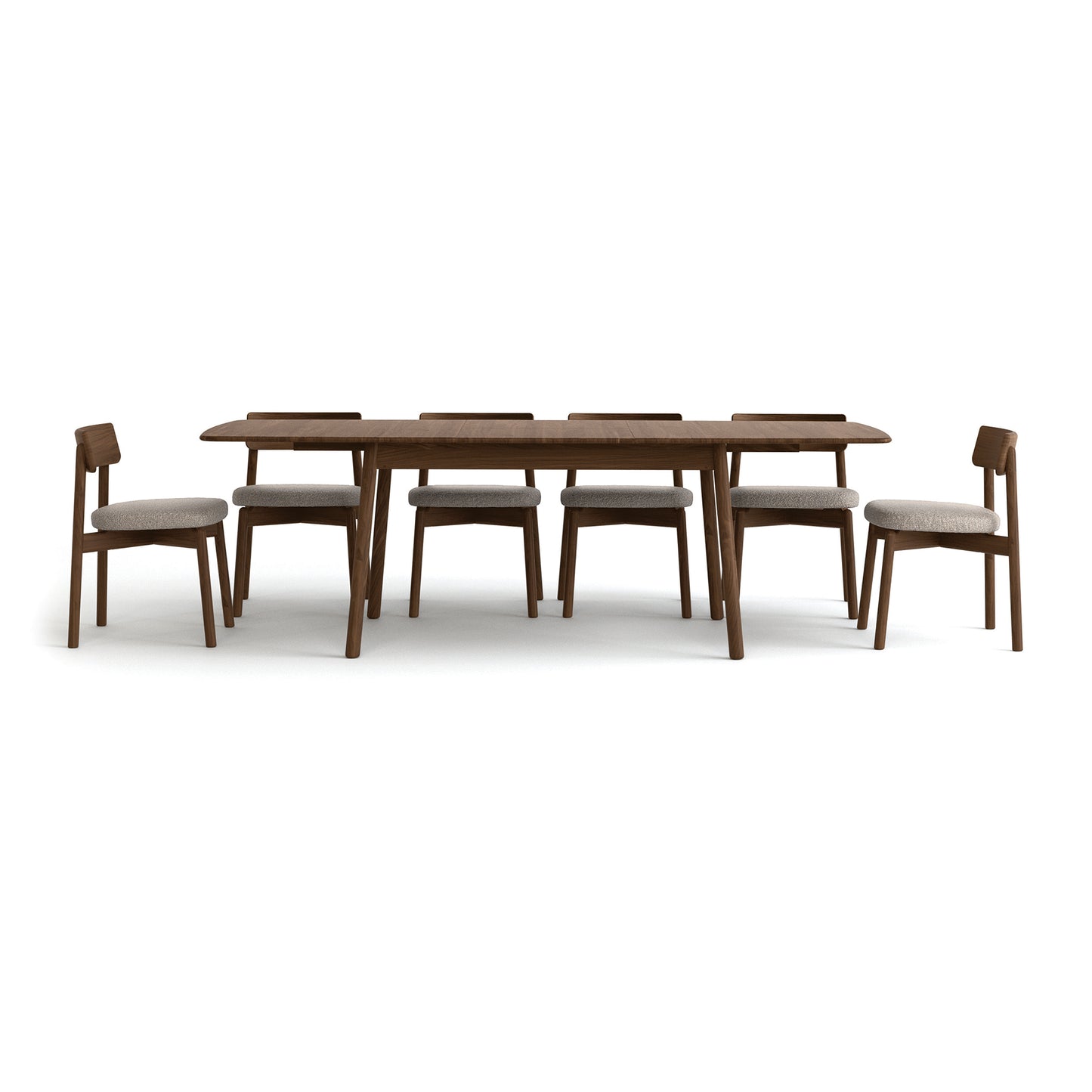 Copeland Furniture Baton Extension Dining Table with six cushioned chairs, crafted in solid wood, highlighting fine detail and modern American design.