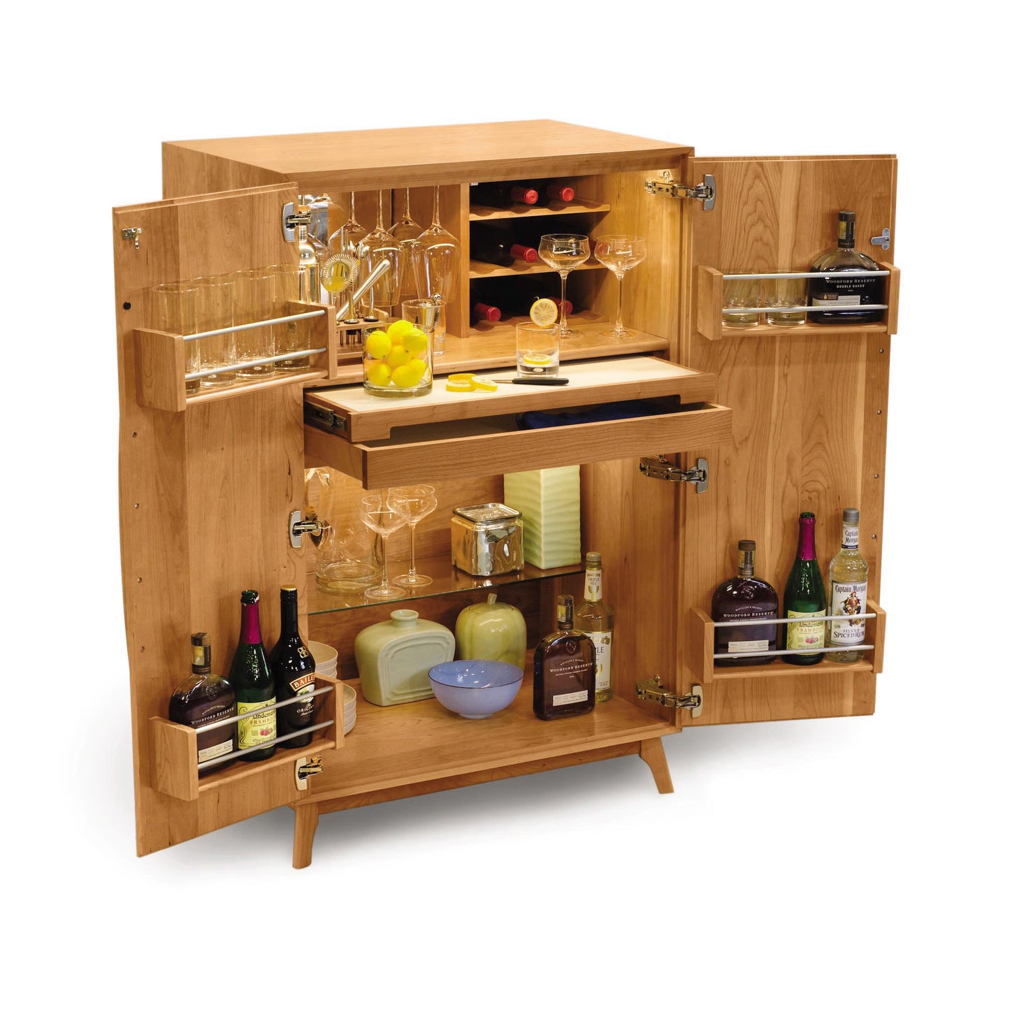 Catalina Bar Cabinet by Copeland Furniture shown with open doors, highlighting its spacious shelves and wine storage. Glassware and bottles displayed inside.