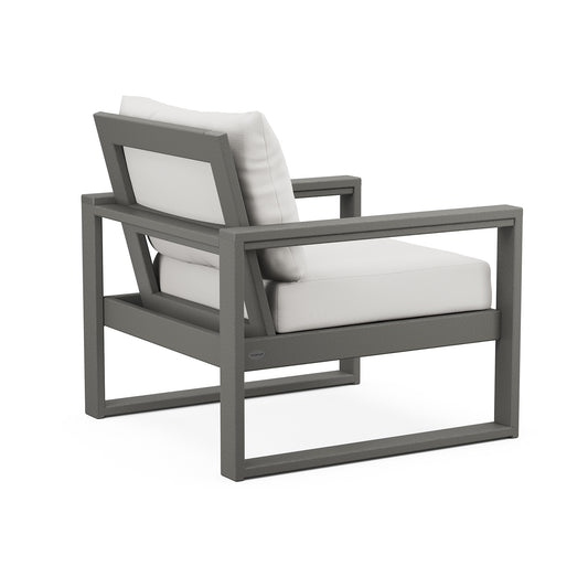 POLYWOOD EDGE Club Chair with green metal frame and white cushions.
