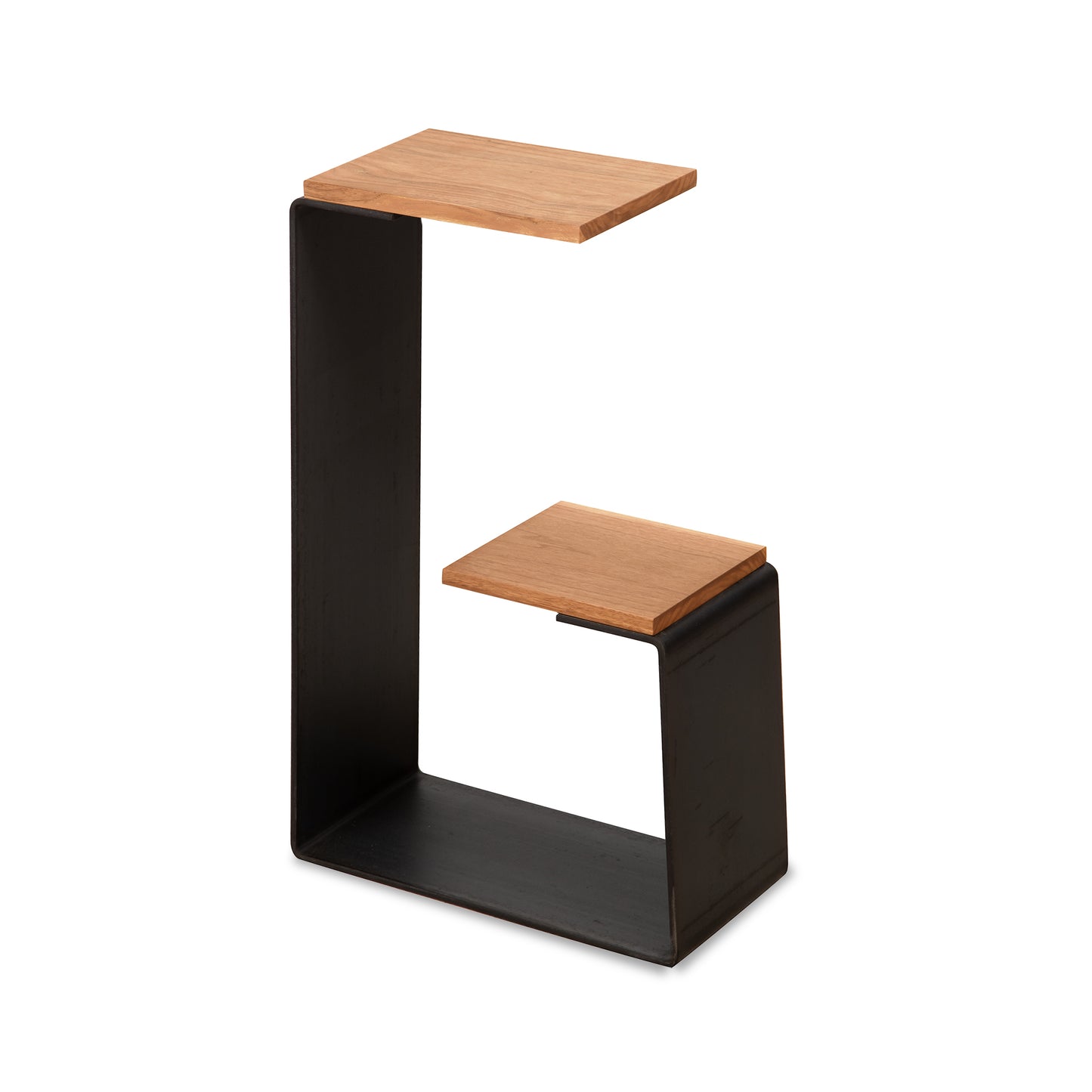 The G Table in Cherry by Vermont Woods Studios features handcrafted steel and cherry wood shelves at varied heights, showcasing modern American-made craftsmanship.