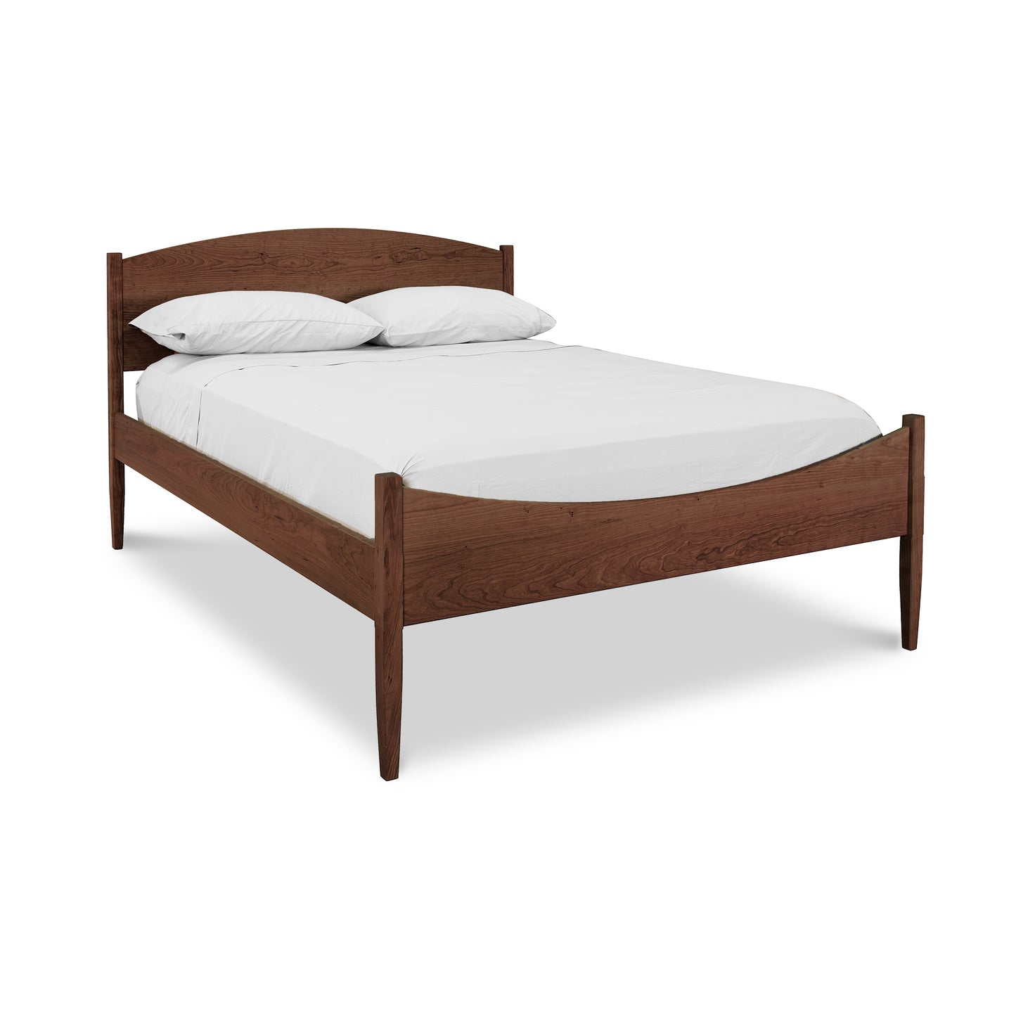 Vermont Shaker Moon Bed by Maple Corner Woodworks showcasing its elegant wooden frame and distinctive headboard.
