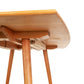 Underside view of the Vermont Addison Boat Top Extension Dining Table by Lyndon Furniture, highlighting its handcrafted support and legs.