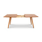 Addison Boat Top Extension Dining Table by Lyndon Furniture in mid-century modern design with extendable leaf mechanism.