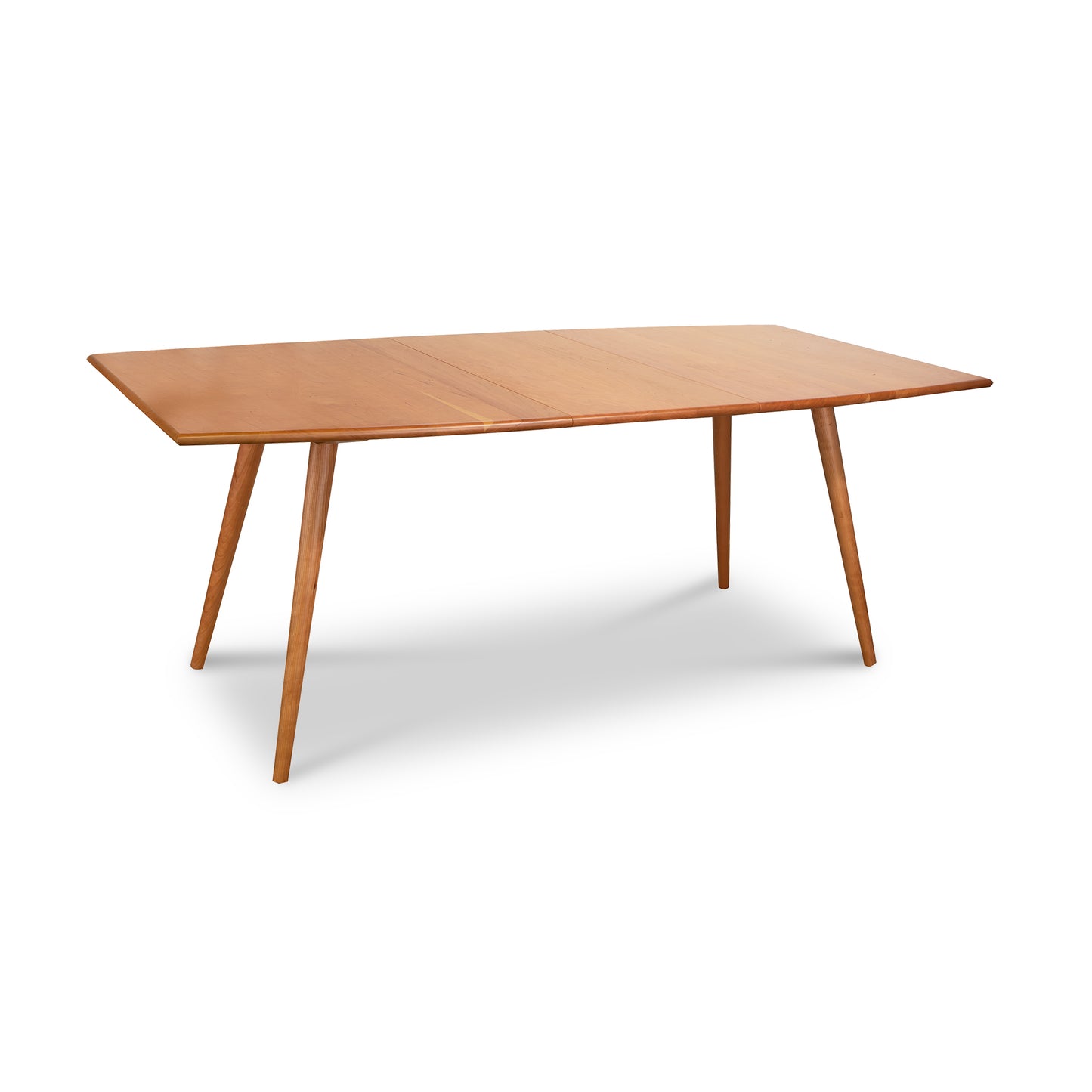 Addison Boat Top Extension Dining Table by Lyndon Furniture, Vermont-made mid-century modern with smooth surface and angled legs.