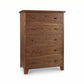 Lyndon Furniture American Country 5-Drawer Chest in solid wood, showcasing a natural finish, round knobs, and classic short legs.
