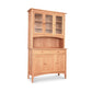 American Shaker 50" China Cabinet featuring glass-paneled upper doors, two lower cabinets, and two central drawers on four sturdy legs by Maple Corner Woodworks.
