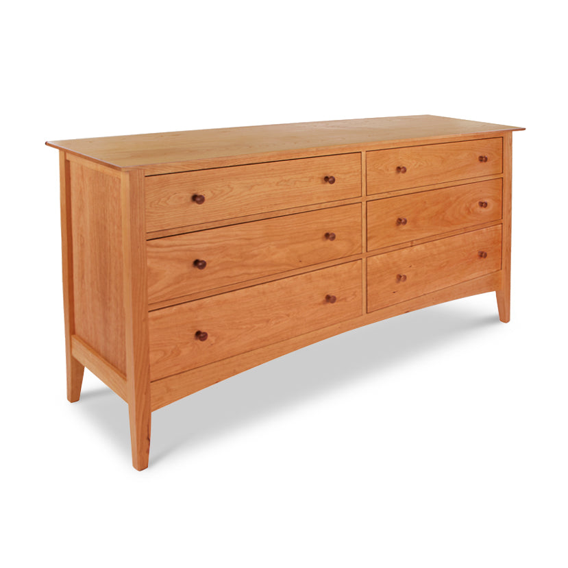 American Shaker 6-Drawer Dresser by Maple Corner Woodworks, crafted from solid wood with six drawers and round knobs; showcases Vermont craftsmanship with its natural finish and smooth, curved sides.