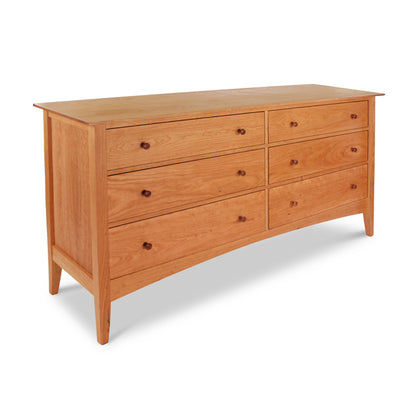 American Shaker 6-Drawer Dresser by Maple Corner Woodworks, crafted from solid wood with six drawers and round knobs; showcases Vermont craftsmanship with its natural finish and smooth, curved sides.