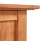 American Shaker File Cabinet by Maple Corner Woodworks featuring a close-up of its light brown wood texture and grain, highlighting the smooth, clean edges crafted with Vermont artisanship.