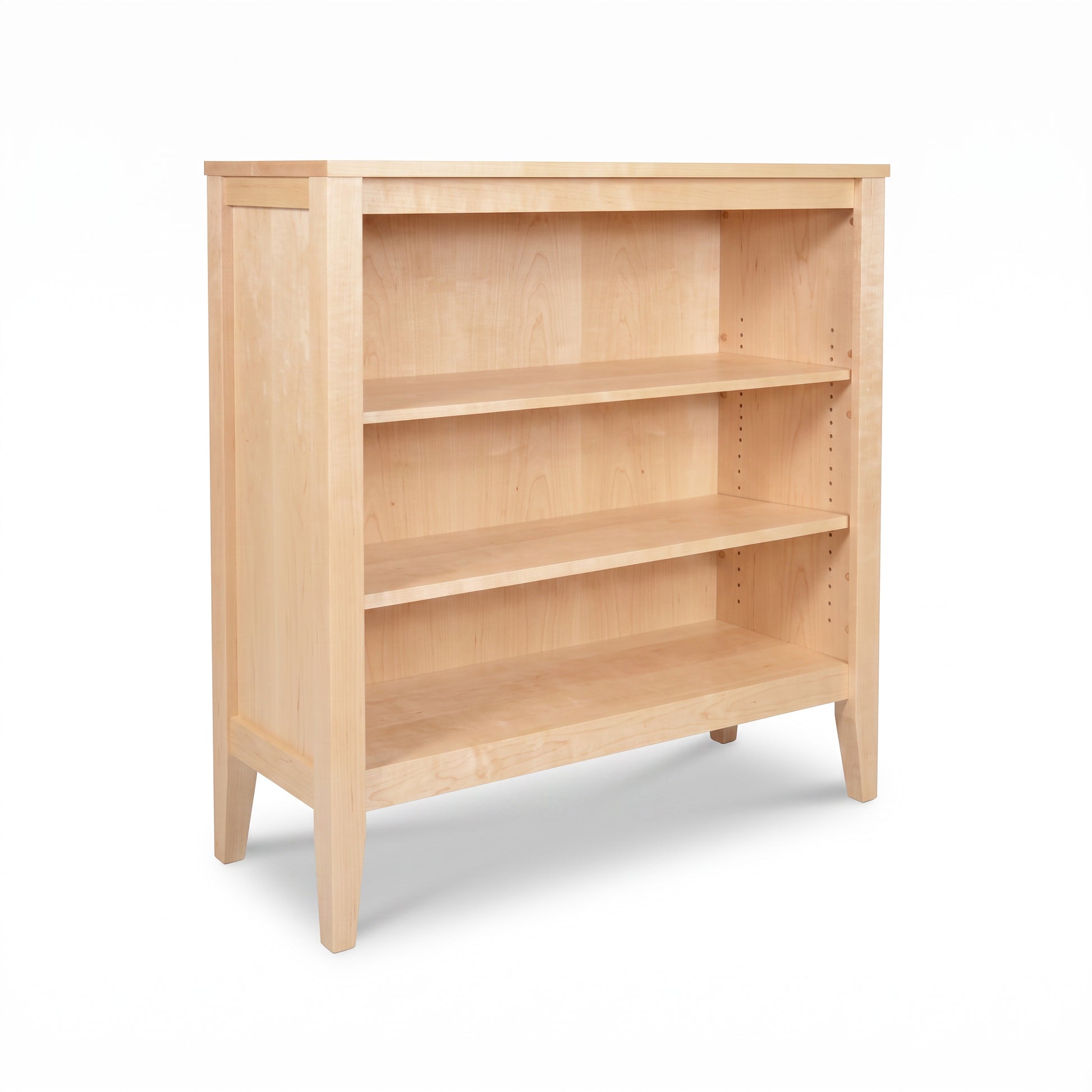 Andover Modern Bookcase by Maple Corner Woodworks, crafted from solid wood with three shelves, four legs, and clean lines in a minimalist style.