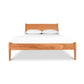 The Andover Modern Incline Bed features a solid wood frame and slatted headboard, highlighting the craftsmanship by Maple Corner Woodworks, complemented by a white mattress and two gray pillows from a front view.
