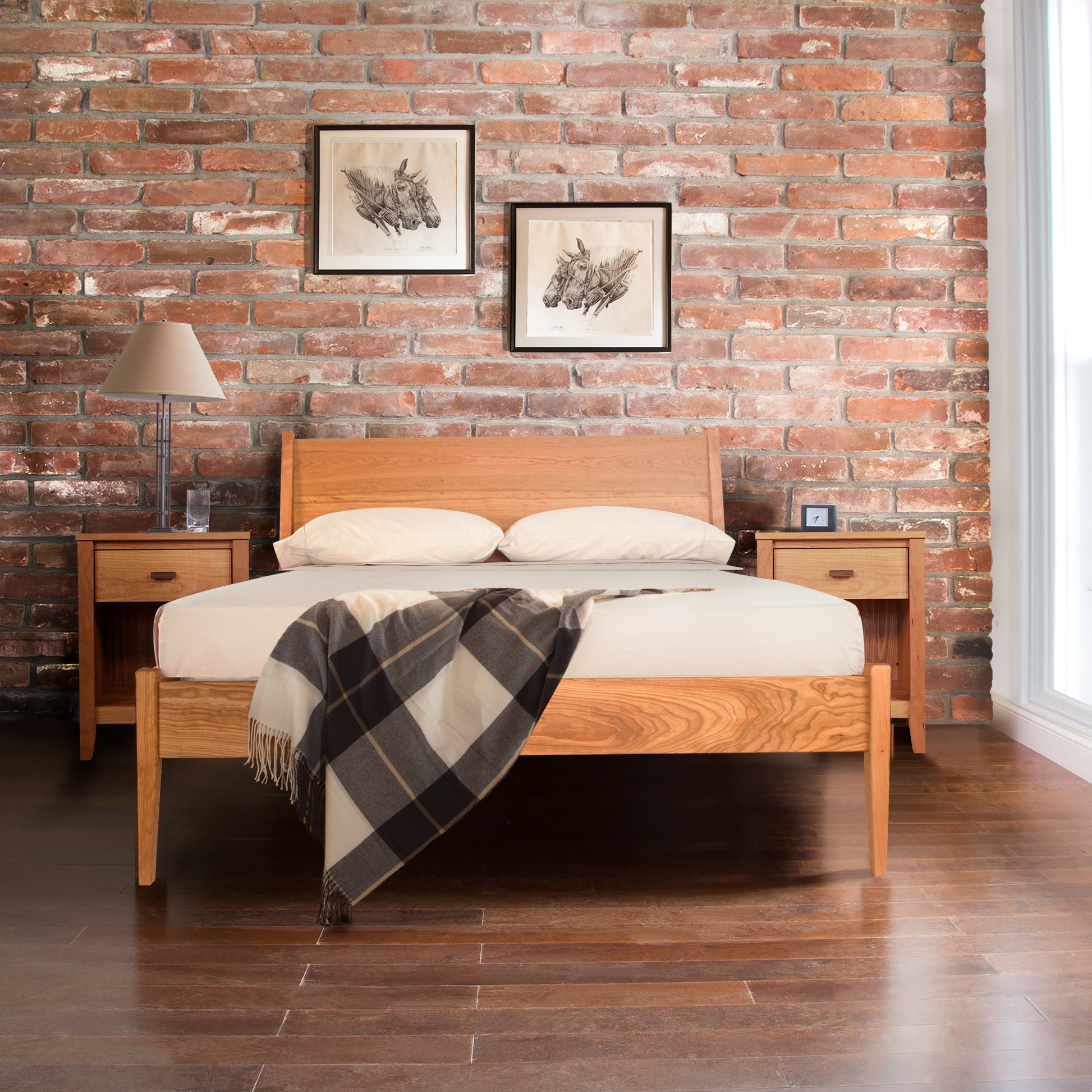 Andover Modern Incline Bed by Maple Corner Woodworks crafted from solid wood with white bedding and a plaid blanket, highlighting its sleek mid-century modern design.
