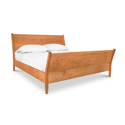 Andover Modern Incline Sleigh Bed by Maple Corner Woodworks with solid hardwood frame and stylish inclined headboard, handcrafted in Vermont.