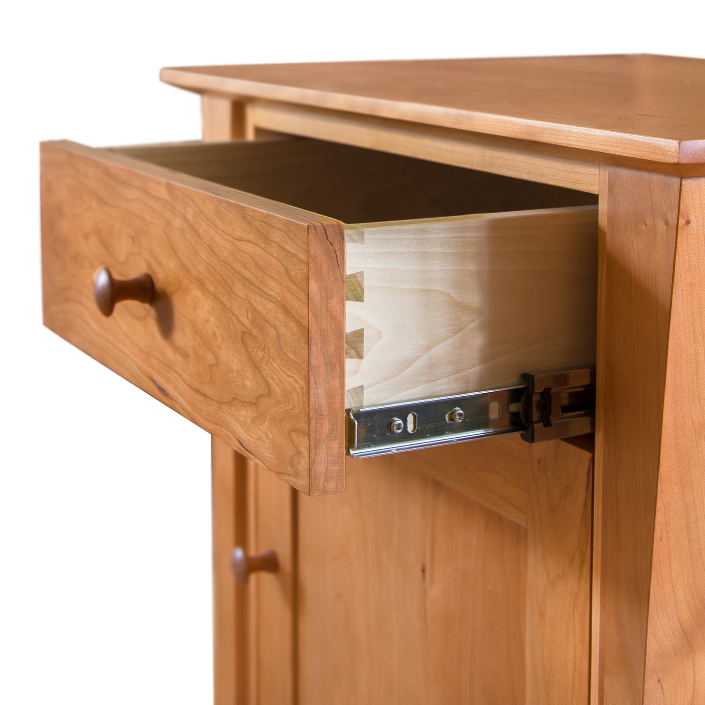 Lyndon Furniture Andrews nightstand featuring a single wood drawer with round knob, dovetail joints, metal runners, and a lower door in handcrafted solid wood.