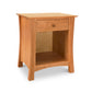 Lyndon Furniture Andrews 1-Drawer Enclosed Shelf Nightstand showcasing natural wood finish, single drawer, and spacious lower shelf for storage.