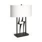 Antasia #1 Table Lamp by Hubbardton Forge with a sculptural dark metal base and rectangular white shade, showcasing elegant American craftsmanship.