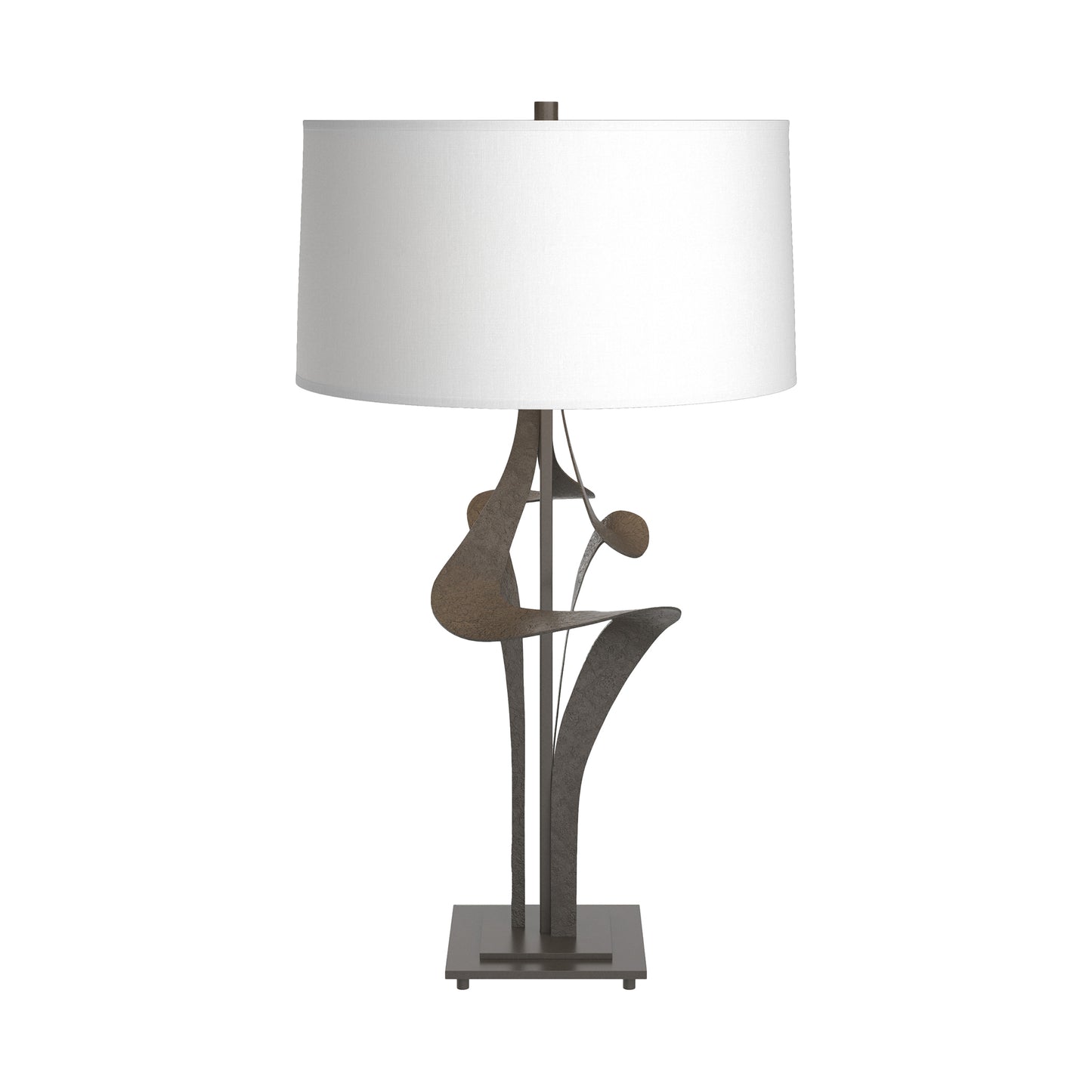 Antasia #2 Table Lamp by Hubbardton Forge with a handcrafted abstract floral metal base and white drum shade, emphasizing fine artisan design.