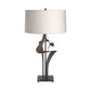 Antasia #2 Table Lamp by Hubbardton Forge with a sculptural black metal base and white drum shade, crafted in a modern, artistic design.