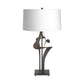 Antasia #2 Table Lamp by Hubbardton Forge, showcasing a handcrafted dark metal base and a sleek white drum shade, American-made artisan lighting.