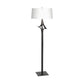 Hubbardton Forge Antasia Floor Lamp with handcrafted metal frame, white drum shade, and slender dark stand on a square base.