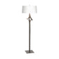 Antasia Floor Lamp by Hubbardton Forge with sculptural metallic base and white drum shade, showcasing modern artisan craftsmanship.