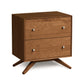 Astrid Nightstand by Copeland Furniture showcasing Scandinavian design with wood construction, featuring metal knobs and angled legs.