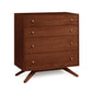 Astrid 4-Drawer Chest by Copeland Furniture with round metal handles, angled legs, and eco-friendly brown-finished wood.