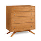 Copeland Astrid Chest, light brown North American hardwood with angled legs and metal knobs.