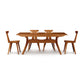 Copeland Furniture Audrey Extension Dining Table with four matching chairs, showcasing modern angled legs and sleek design.