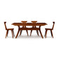 Copeland Furniture Audrey Extension Dining Table set with four matching chairs, displaying angular legs and a rich cherry wood finish.