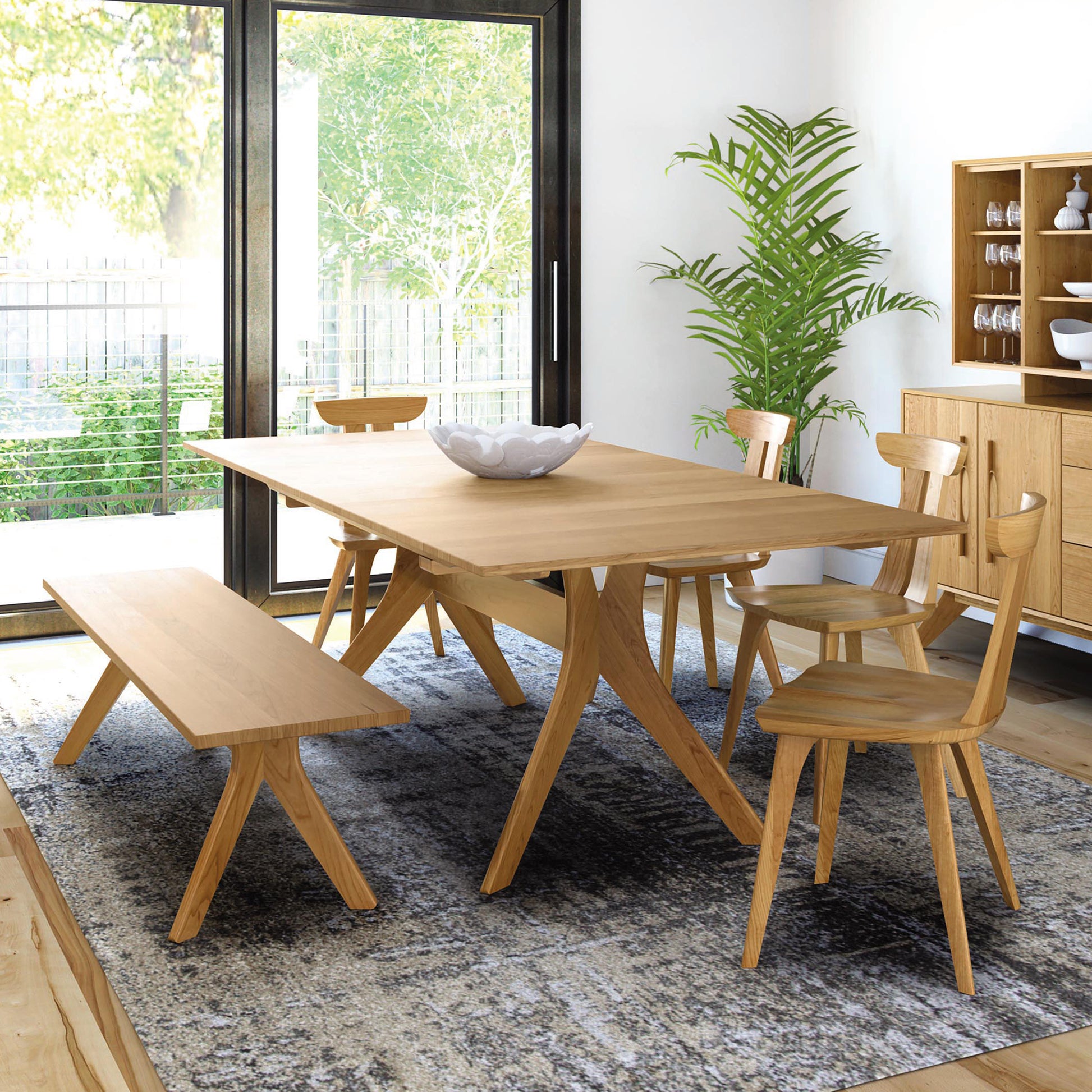 Copeland Furniture Audrey Extension Dining Table with matching chairs and bench in a modern style, crafted from wood.