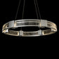 Hubbardton Forge Aura Glass Pendant with circular design, metal accents, and bubble details.
