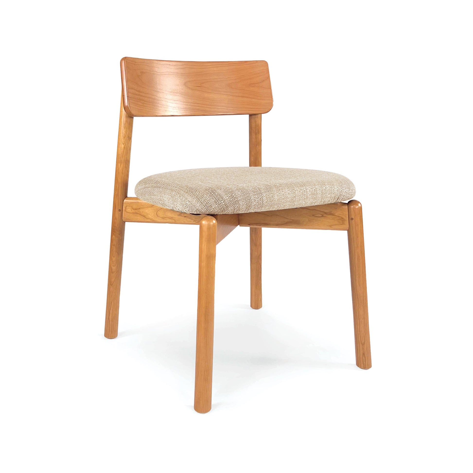 Baton Chair by Copeland Furniture with light brown wood frame, beige cushioned seat, and flat wooden backrest. American made fine craftsmanship.