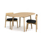 Copeland Furniture Baton Drop-Leaf Dining Table set with mid-century design, rounded edges, and matching chairs handcrafted in Vermont.