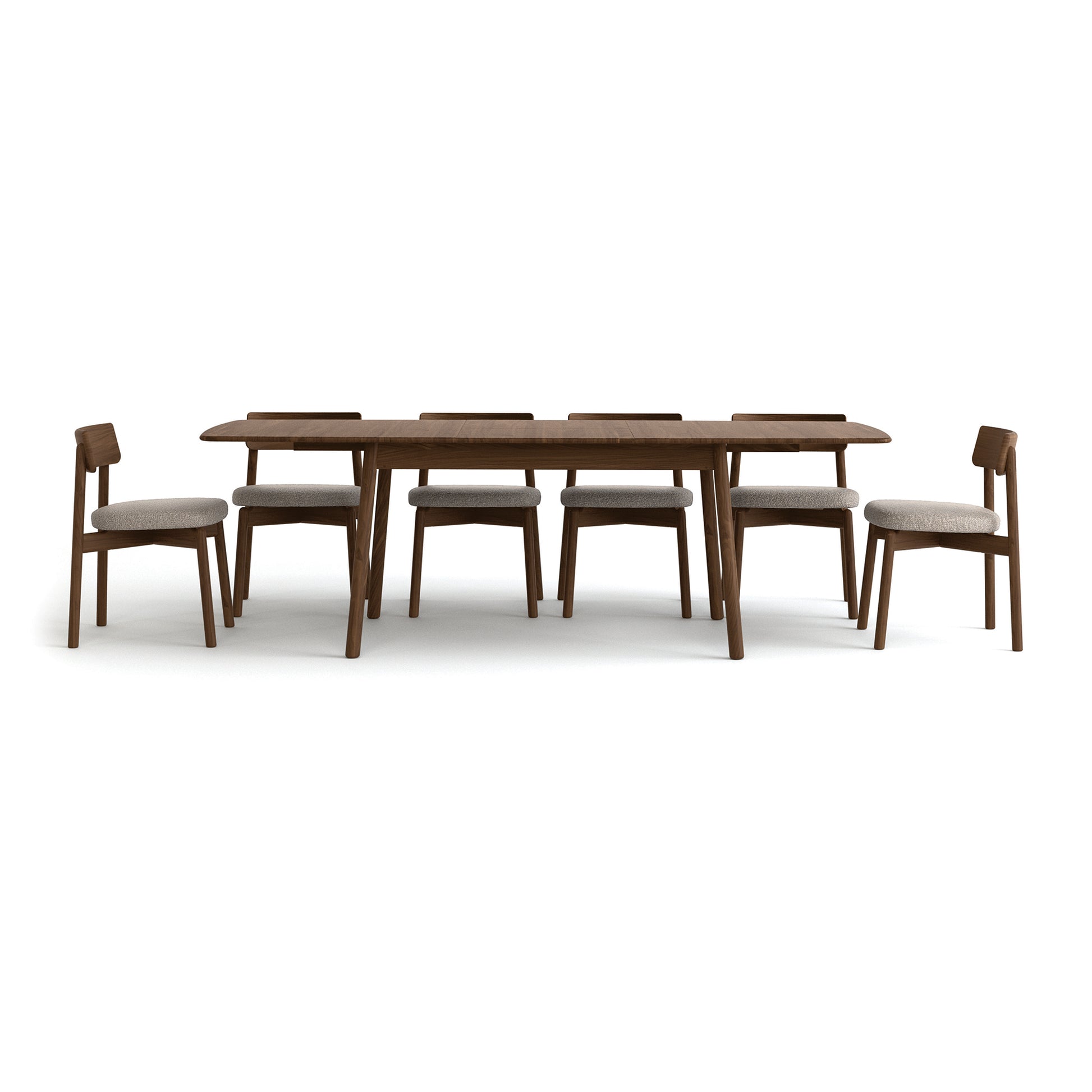Copeland Furniture Baton Extension Dining Table with six cushioned chairs, crafted in solid wood, highlighting fine detail and modern American design.
