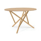 Baton Round Solid Top Dining Table by Copeland Furniture with distinctive angled legs and a sleek, contemporary solid wood top, American made.