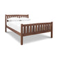Bennington Bed with High Footboard by Vermont Furniture Designs featuring vertical slats, crafted in solid wood, shown with minimal bedding.