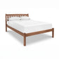 Bennington Bed with Low Footboard by Vermont Furniture Designs, featuring a white mattress and pillows, crafted in solid wood.