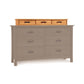 Copeland Berkeley Accessory Case in cherry wood featuring three small and six large drawers, highlighting the case’s design and craftsmanship.