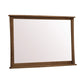 Berkeley Wall Mirror by Copeland Furniture with a minimalist walnut frame, highlighting its clean lines and craftsmanship.