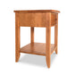 Lyndon Furniture Bow Front 1-Drawer Open Shelf Nightstand handcrafted from sustainable wood, highlighting its elegant curved front and open shelf design.
