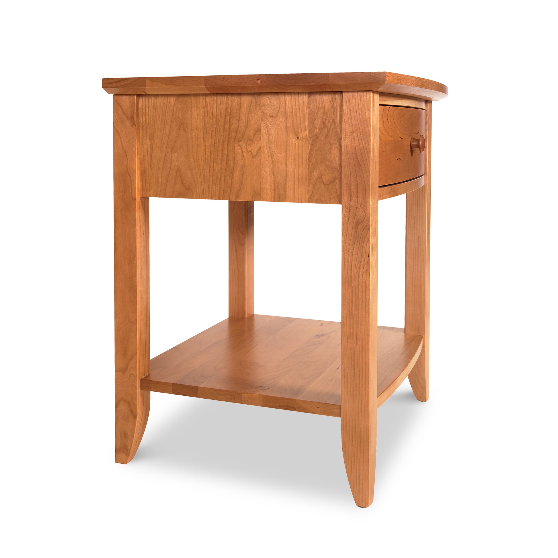 Lyndon Furniture Bow Front 1-Drawer Open Shelf Nightstand handcrafted from sustainable wood, highlighting its elegant curved front and open shelf design.