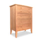 Lyndon Furniture Bow Front 5-Drawer Chest crafted from solid hardwoods in a natural finish, showcasing elegant bow front design and smooth drawer fronts.
