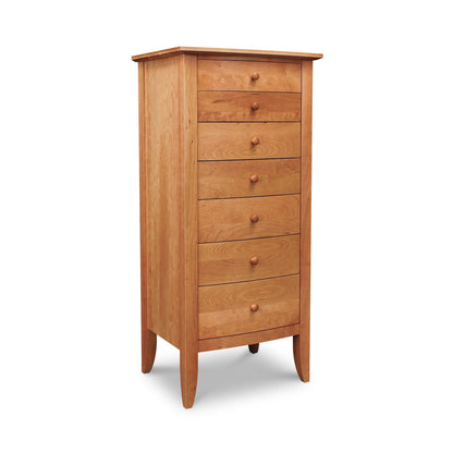 Lyndon Furniture Bow Front 7-Drawer Lingerie Chest handcrafted from sustainable hardwoods, showcasing elegant wood grain and sleek bow front design.