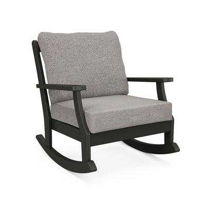 POLYWOOD Braxton Rocking Chair with a dark wooden frame and light gray cushions for elegant, sustainable seating.