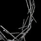 Brindille Ring Lamp by Hubbardton Forge showcases handcrafted, intertwining metallic rods in an organic ring design, crafted in Vermont.