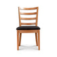 Bromley Ladder-Back Chair by Vermont Woods Studios with black upholstery, shown from the front to highlight craftsmanship and design details.