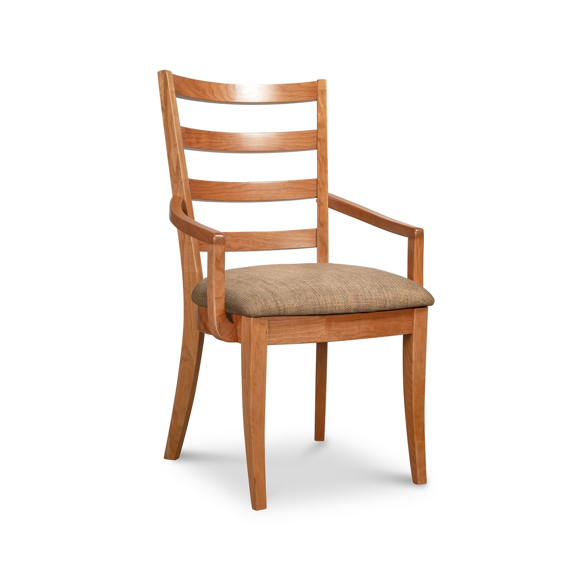 The Bromley Ladder-Back Chair by Vermont Woods Studios with black upholstery and solid wood craftsmanship in a classic design.