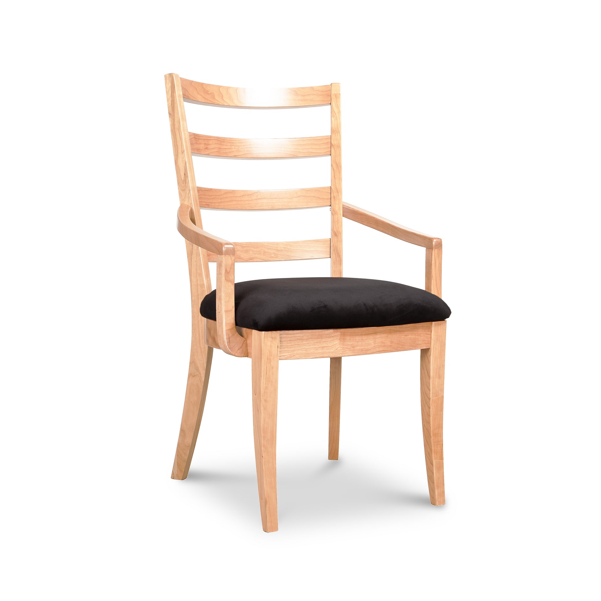 Bromley Ladder-Back Chair by Vermont Woods Studios with black upholstery and curved arms, highlighting its elegant American-made craftsmanship.