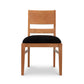 Burke Modern Chair by Vermont Woods Studios with black upholstery, straight legs, and slatted backrest displayed from the front.